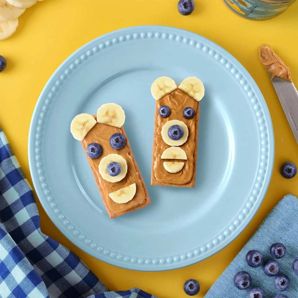 Honey Maid Honey Grahams Party Size, graham cracker snack with banana and blueberries
