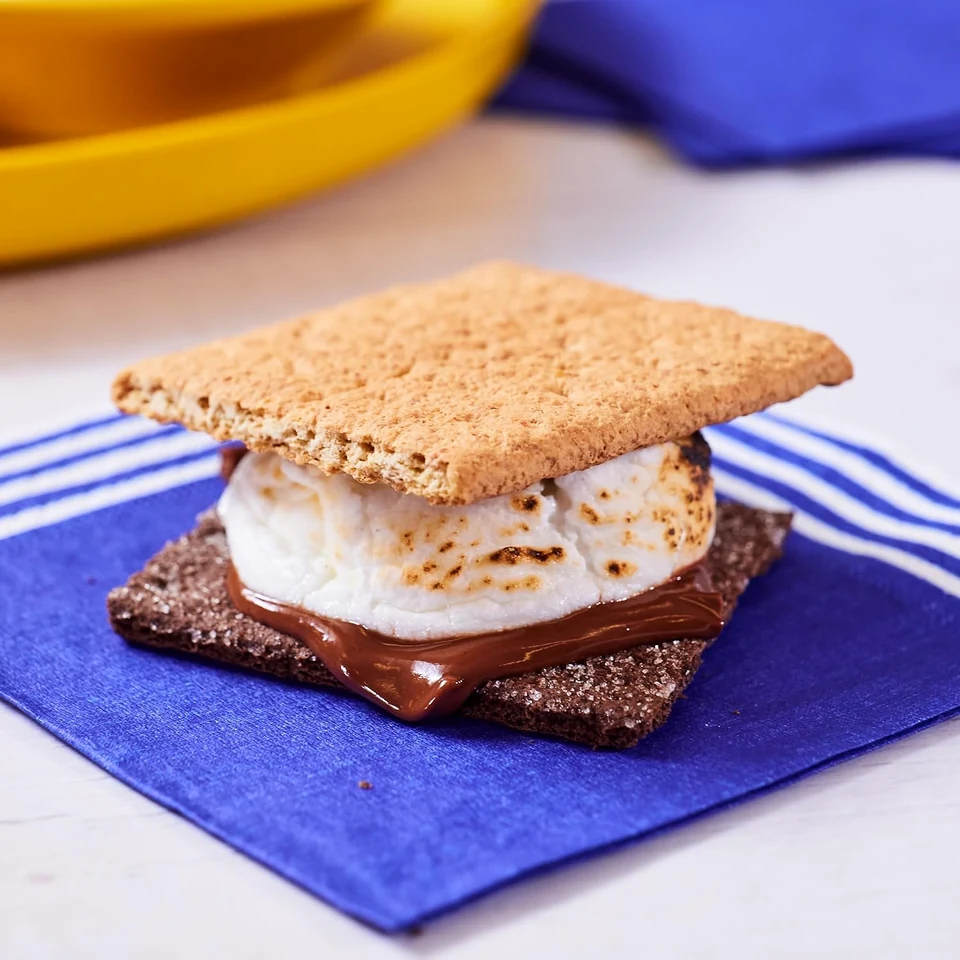 A graham cracker s’more with toasted marshmallow and chocolate